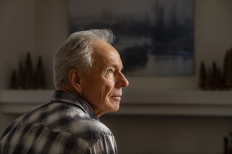 Profile view of senior man thinking