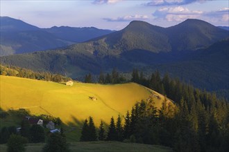 Rural area in Carpathian Mountains at sunset