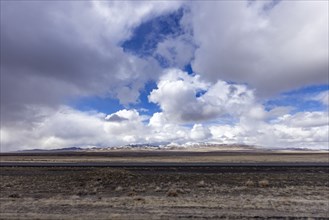 McDermitt, White clouds above desert and mountains in background