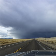 McDermitt, Highway leading towards storm clouds on horizon