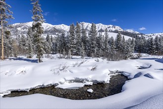 River flowing in mountains in winter
