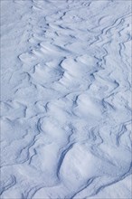 Abstract patterns on snow, full frame