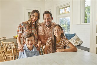 Portrait of smiling family with two children