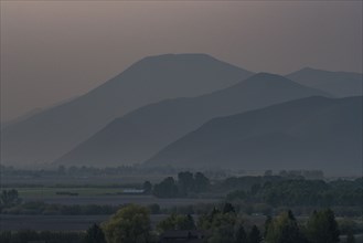 Silhouette of mountains at dusk