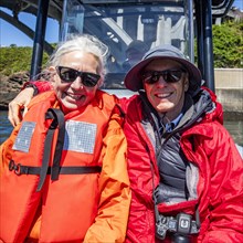 Senior couple on boat returning from whale watching at Depoe Bay