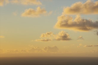 USA, United States Virgin Islands, St. John, Clouds over Caribbean Sea at sunrise