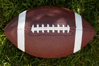 Overhead view of American football ball on field
