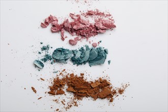 Studio shot of colorful eyeshadow on white background