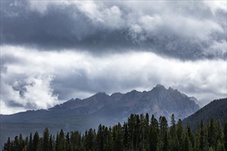 USA, Idaho, Stanley, Clouds over jagged peaks of Sawtooth Mountains
