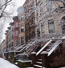 Brooklyn brownstones covered with snow