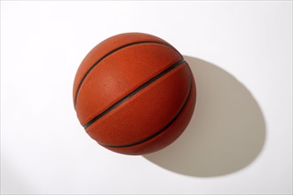 Overhead view of basketball on white background