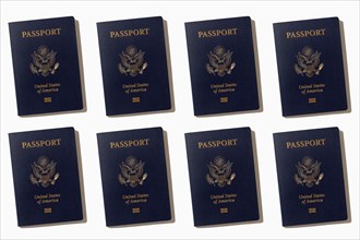 Rows of American passports on white background