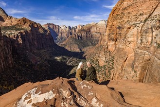 Portrait of senior couple looking at Zion Canyon from Zion Overlook