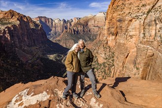 Portrait of smiling senior couple at Zion Overlook