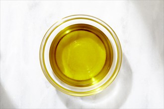 Overhead view of bowl of olive oil, New York, NY, USA