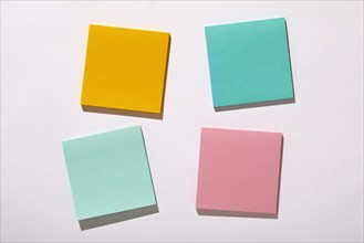 Colorful blank adhesive notes on white background, New York, NY, USA