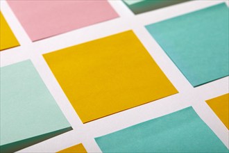 Close-up of colorful blank adhesive notes on white background, New York, NY, USA