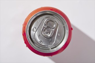 Overhead view of can of soda on white background, New York, NY, USA