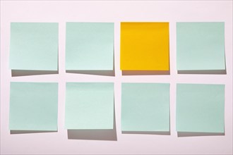 Rows of blank adhesive notes on white background, New York, NY, USA