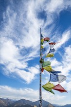 Prayer flags fluttering in wind atop Carbonate Mountain, Hailey, Idaho, USA