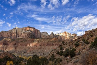 Puffy clouds over rock formations in Zion National Park, , Utah, USA