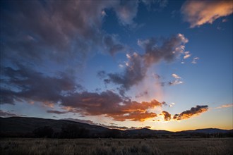 Romantic sky at sunset above landscape, Bellevue, Idaho, USA