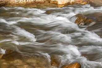 Close-up of water flowing on rocks, long exposure, , Utah, USA