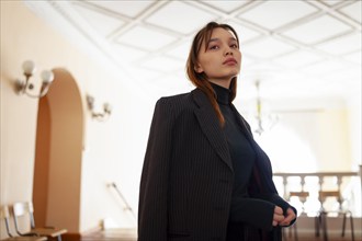 Portrait of woman standing in hallway, Novosibirsk, , Russia