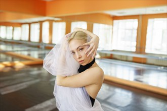 Portrait of ballerina in ballet studio, Omsk, , Russia