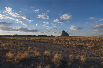 Usa, New Mexico, Shiprock, Clouds over desert landscape with Shiprock, Shiprock, New Mexico, USA