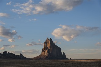 Usa, New Mexico, Shiprock, Clouds over desert landscape with Shiprock, Shiprock, New Mexico, USA