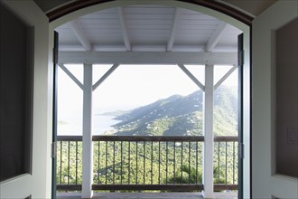 USA, United States Virgin Islands, St. John, Hills and coast seen from balcony, St. John, United