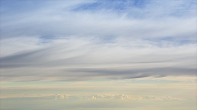 Layers of clouds from altitude 31,000 feet at sunrise, Miles City, Miles City, Florida, USA