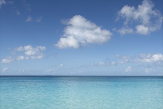 USA, Virgin Islands, Puffy clouds over calm Caribbean Sea, St. John, United States Virgin Islands,