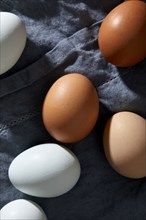 Close-up of white and brown eggs, New York, New York, USA