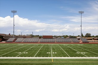 Empty football field and bleachers, Winslow, Arizona, USA