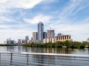 USA, Texas, Austin, Downtown buildings seen across river, Austin, Texas, USA