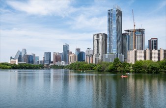 USA, Texas, Austin, Downtown buildings seen across river, Austin, Texas, USA