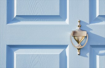 USA, New Jersey, Mendham, Close-up of blue front door with brass door knocker, Mendham, New Jersey,