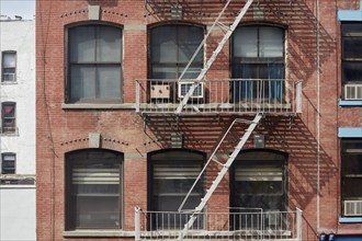 New York City, NY, USA, Apartment building windows and fire escape, New York City, New York, USA