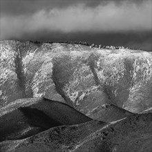 Low clouds covering foothills in snow, black and white, Bellevue, Idaho, USA