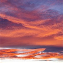 Orange clouds on sky at sunset, Fairfield, Idaho, USA