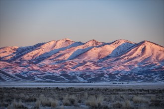 Snow covered hills at sunrise, Fairfield, Idaho, USA