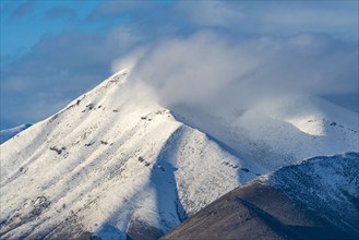 Snowy hills obscured with low cloud, Bellevue, Idaho, USA