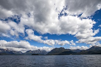 Puffy white clouds over Lake Nahuel Huapi, Bariloche, Rio Negro, Argentina