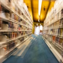 Bookshelves in public library, blurred motion, Ketchum, Idaho, USA