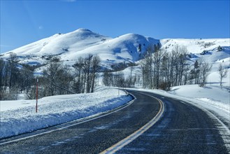 Winding interstate at snow covered foothills, Fairfield, Idaho, USA