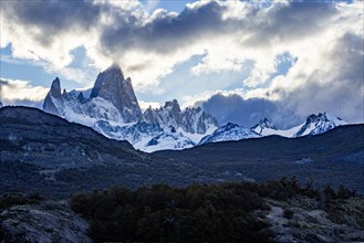 Argentina, Santa Cruz, El Chalten, Clouds above Fitz Roy massif at sunset, El Chalten, Santa Cruz,