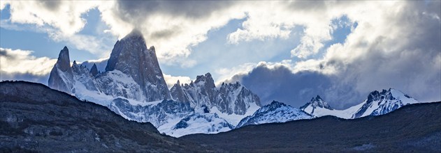 Argentina, Santa Cruz, El Chalten, Clouds above Fitz Roy massif at sunset, El Chalten, Santa Cruz,