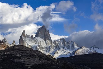 Argentina, Santa Cruz, El Chalten, Clouds above snow covered Mount Fitz Roy, El Chalten, Santa